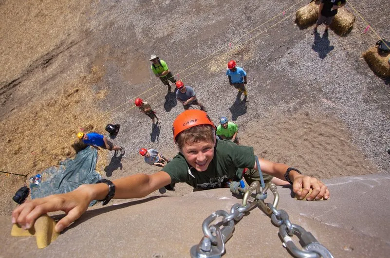 Scouts climbing easily available rock formations