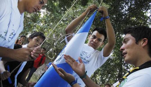 Participants learning the value of the National Flag and how to treat it properly.